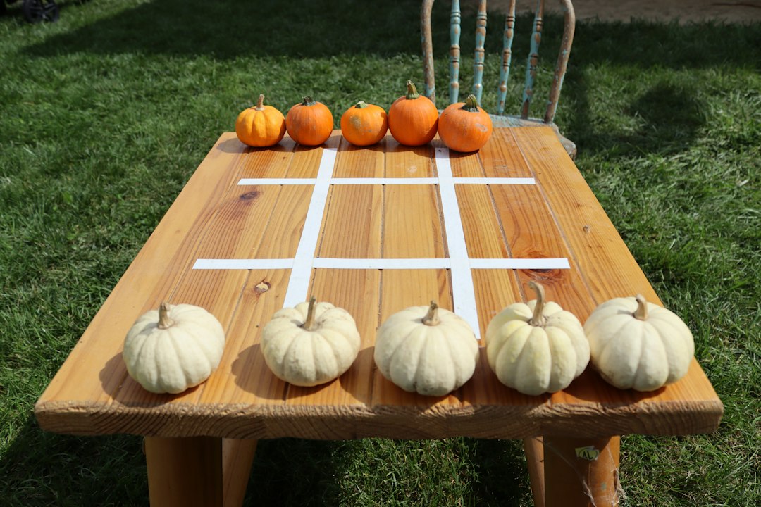 Thanksgiving bingo for adults set up on a wooden table